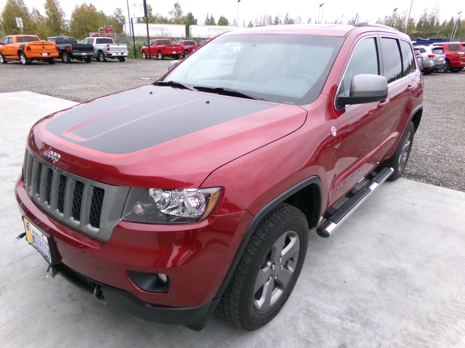 2013 Red Jeep Grand Cherokee Laredo 4WD (1C4RJFAG7DC) with an 3.6L V6 DOHC 24V engine, 5-Speed Automatic transmission, located at 2630 Philips Field Rd., Fairbanks, AK, 99709, (907) 458-0593, 64.848068, -147.780609 - Photo #0