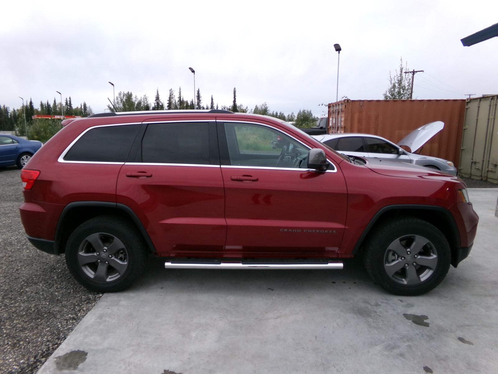 2013 Red Jeep Grand Cherokee Laredo 4WD (1C4RJFAG7DC) with an 3.6L V6 DOHC 24V engine, 5-Speed Automatic transmission, located at 2630 Philips Field Rd., Fairbanks, AK, 99709, (907) 458-0593, 64.848068, -147.780609 - Photo #2