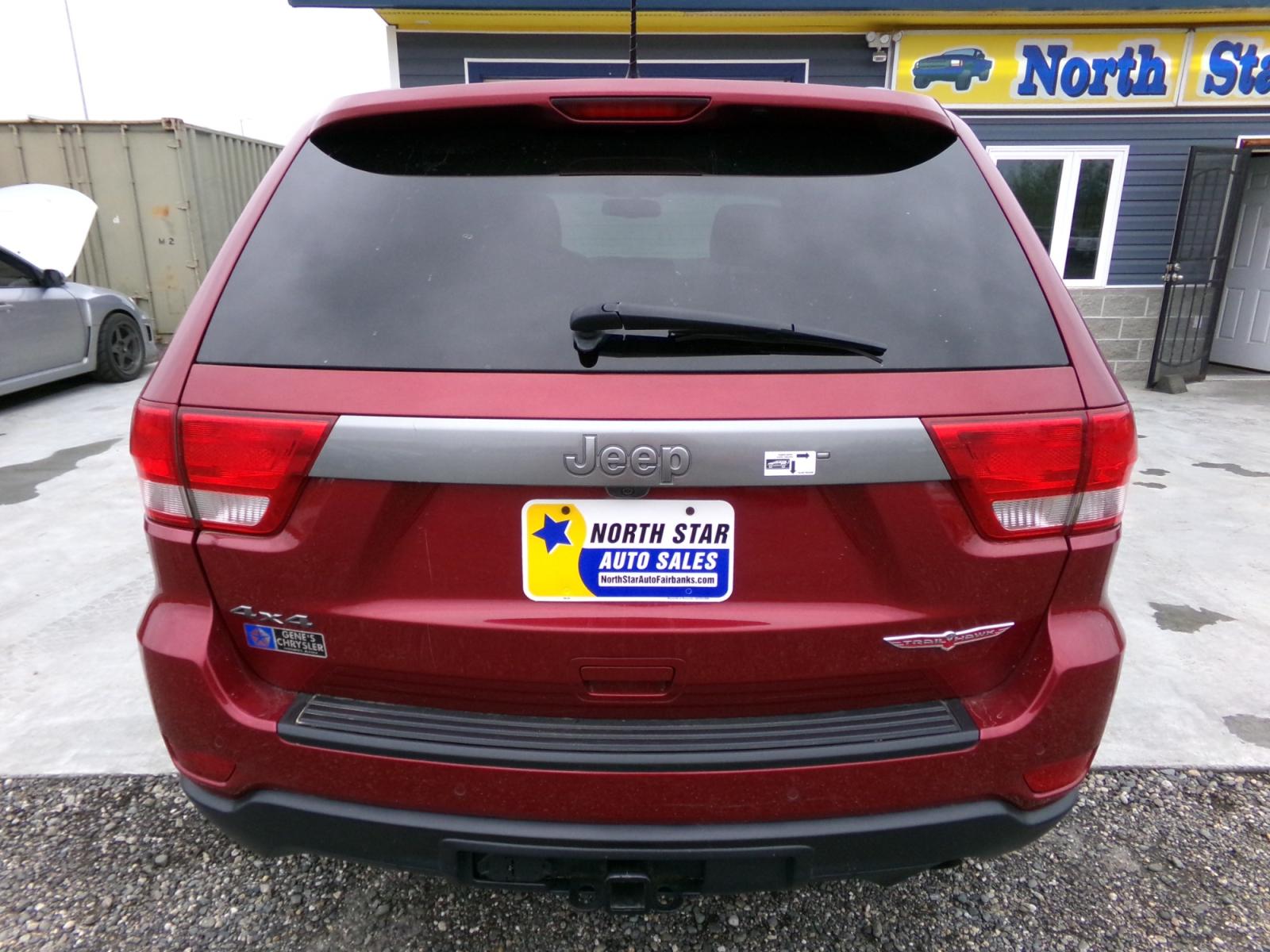 2013 Red Jeep Grand Cherokee Laredo 4WD (1C4RJFAG7DC) with an 3.6L V6 DOHC 24V engine, 5-Speed Automatic transmission, located at 2630 Philips Field Rd., Fairbanks, AK, 99709, (907) 458-0593, 64.848068, -147.780609 - Photo #3