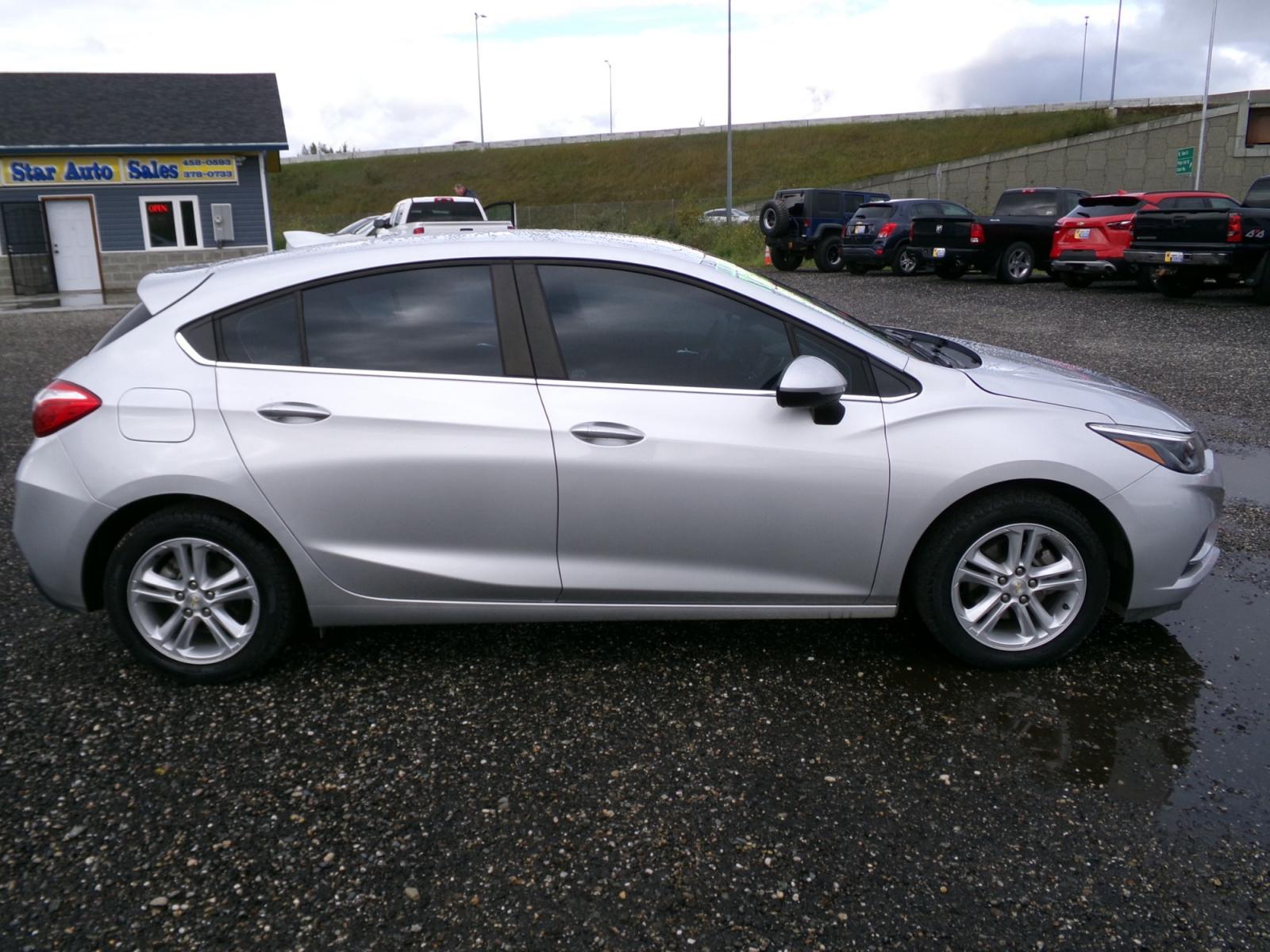 2017 Silver Chevrolet Cruze LT Auto Hatchback (3G1BE6SM2HS) with an 1.4L L4 DOHC 16V TURBO engine, 6A transmission, located at 2630 Philips Field Rd., Fairbanks, AK, 99709, (907) 458-0593, 64.848068, -147.780609 - Photo #2