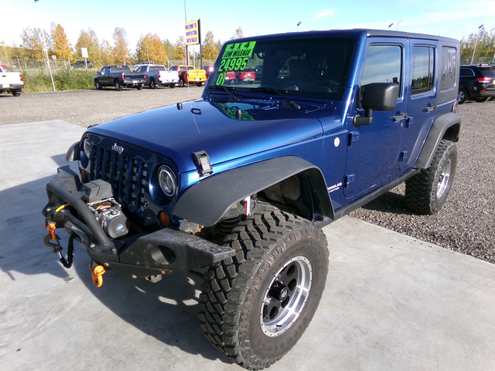 2010 Blue Jeep Wrangler Unlimited Rubicon 4WD (1J4BA6H18AL) with an 3.8L V6 OHV 12V engine, located at 2630 Philips Field Rd., Fairbanks, AK, 99709, (907) 458-0593, 64.848068, -147.780609 - Photo #0