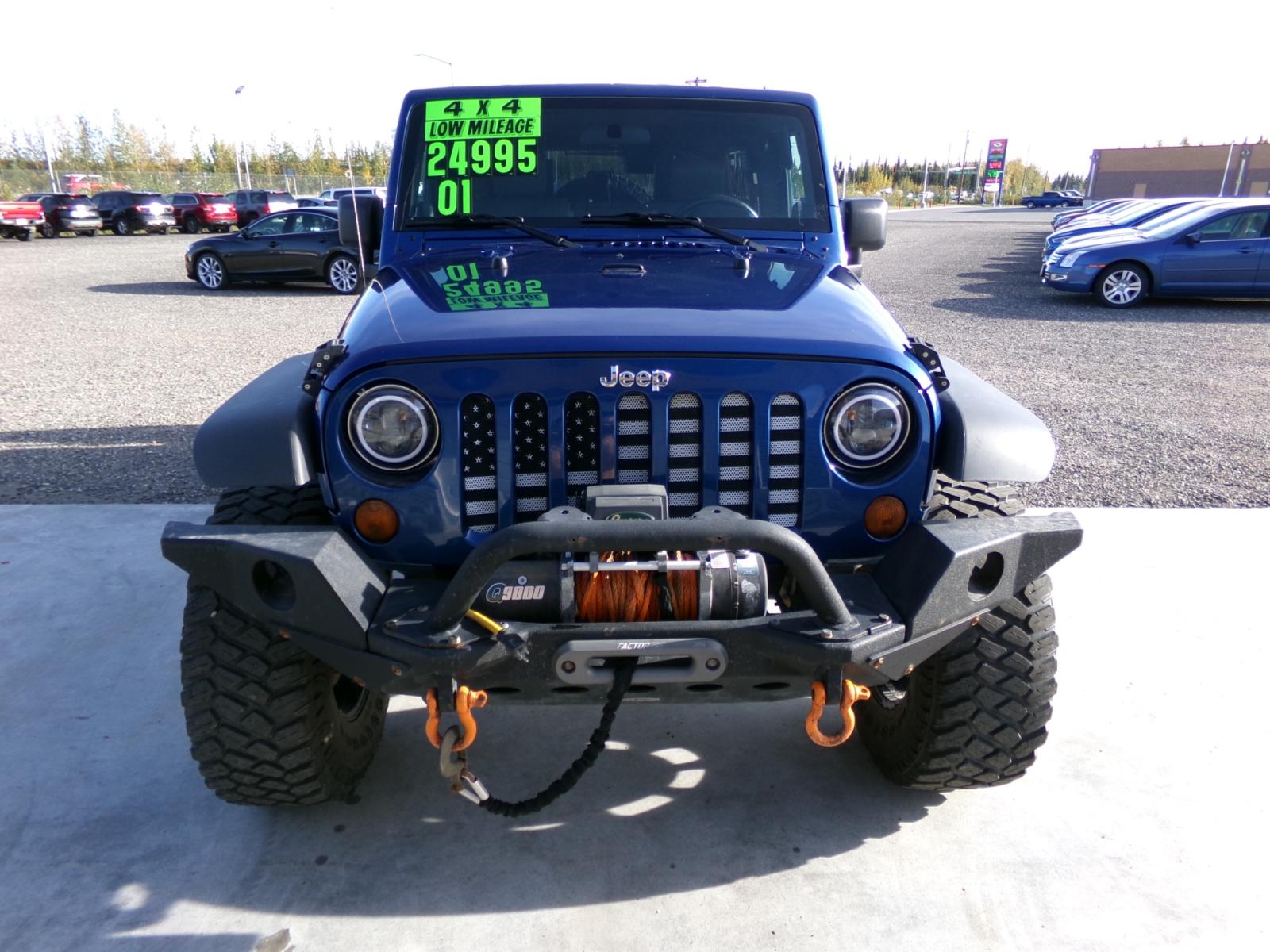 2010 Blue Jeep Wrangler Unlimited Rubicon 4WD (1J4BA6H18AL) with an 3.8L V6 OHV 12V engine, located at 2630 Philips Field Rd., Fairbanks, AK, 99709, (907) 458-0593, 64.848068, -147.780609 - Photo #1