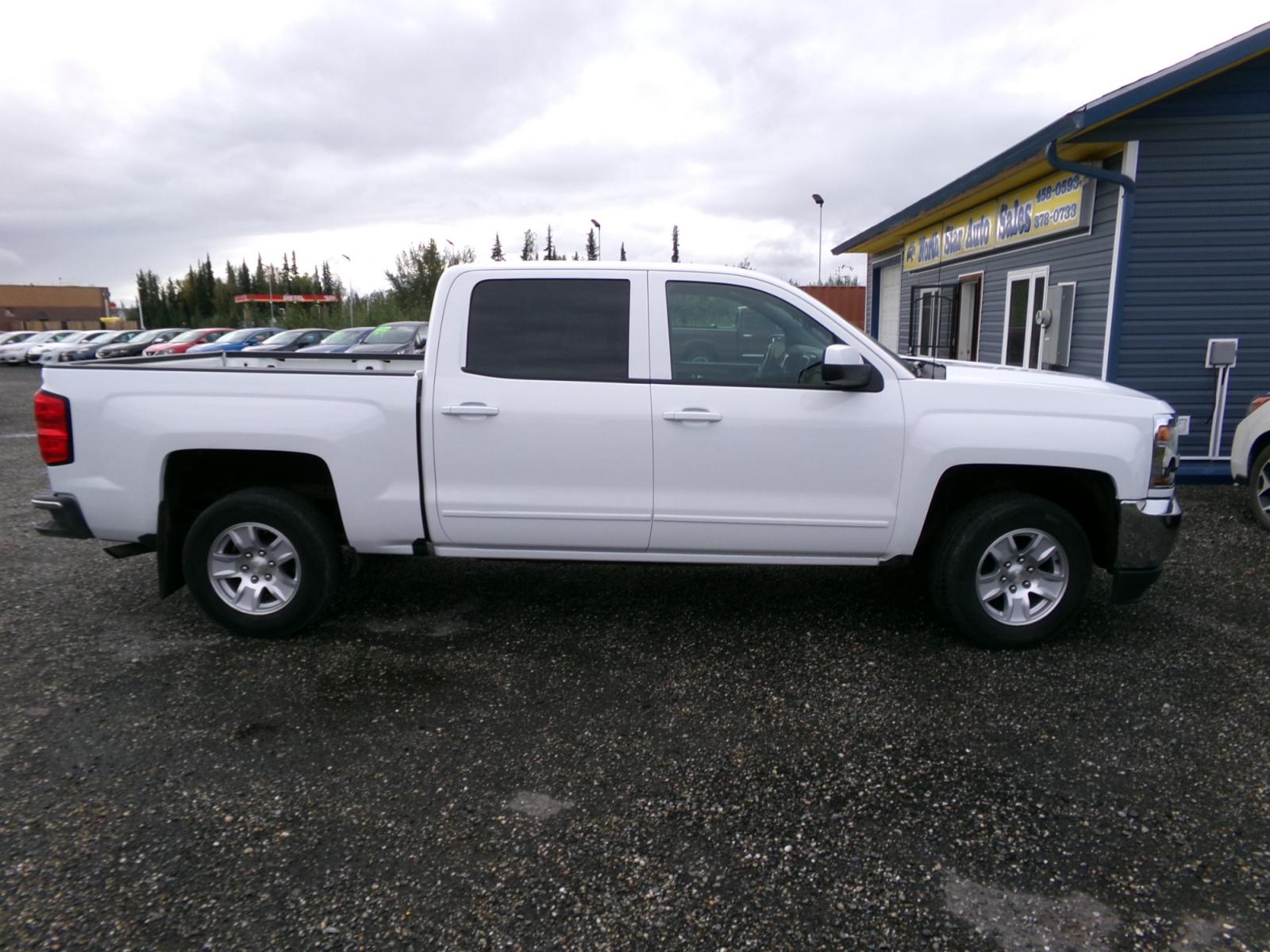 2018 White Chevrolet Silverado 1500 LT Crew Cab Long Box 4WD (3GCUKREC5JG) with an 5.3L V8 OHV 16V engine, 6A transmission, located at 2630 Philips Field Rd., Fairbanks, AK, 99709, (907) 458-0593, 64.848068, -147.780609 - Photo #2