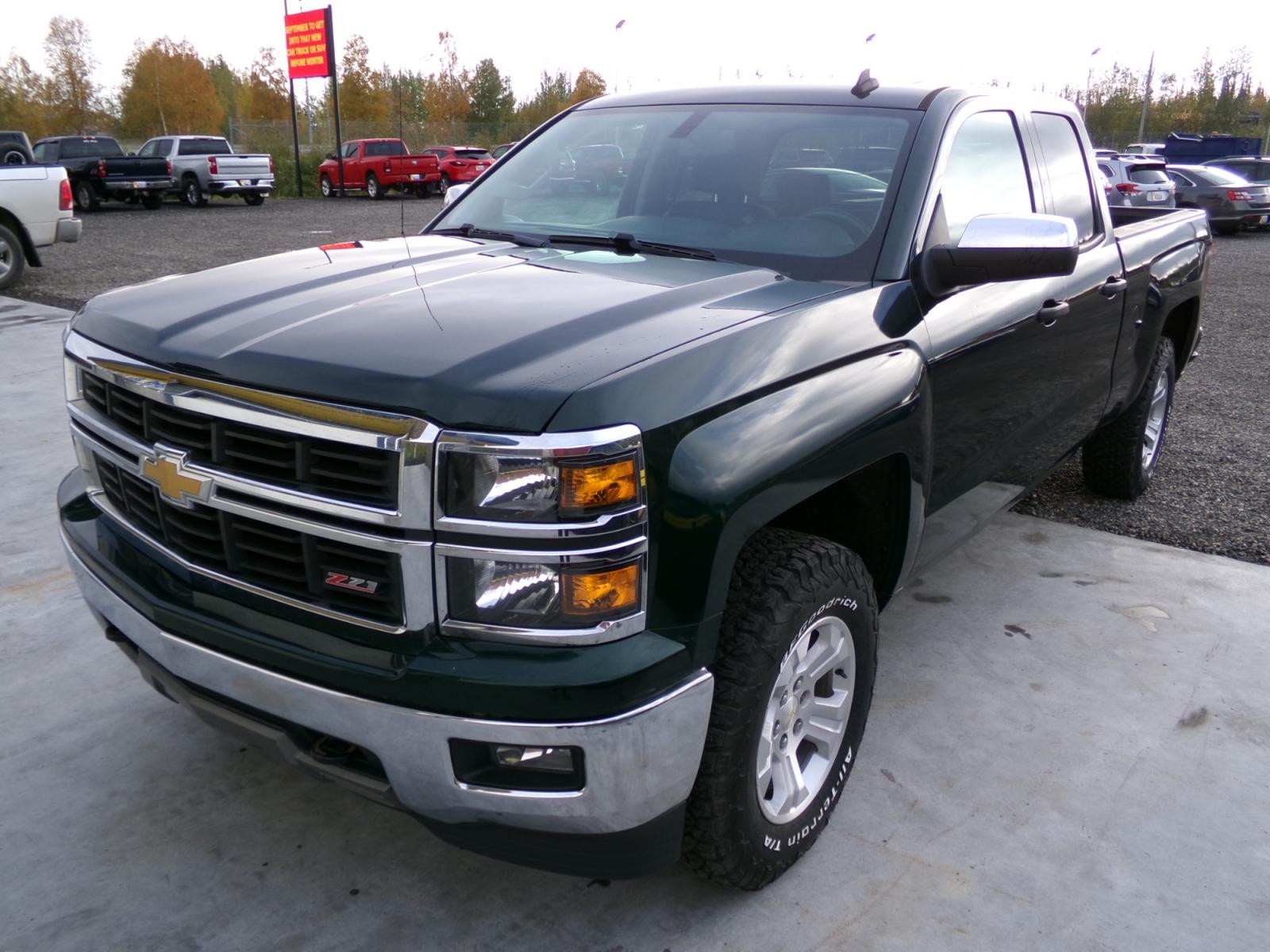 2014 Green Chevrolet Silverado 1500 1LT Double Cab 4WD (1GCVKREC9EZ) with an 5.3L V8 OHV 16V engine, 6-Speed Automatic transmission, located at 2630 Philips Field Rd., Fairbanks, AK, 99709, (907) 458-0593, 64.848068, -147.780609 - Photo #0