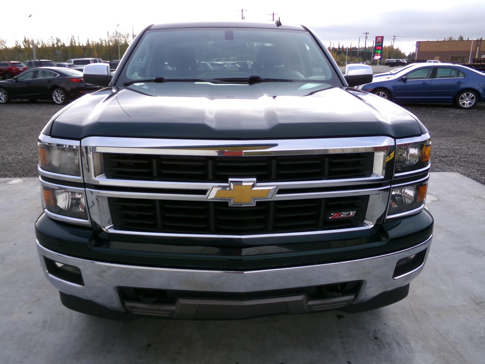 2014 Green Chevrolet Silverado 1500 1LT Double Cab 4WD (1GCVKREC9EZ) with an 5.3L V8 OHV 16V engine, 6-Speed Automatic transmission, located at 2630 Philips Field Rd., Fairbanks, AK, 99709, (907) 458-0593, 64.848068, -147.780609 - Photo #1