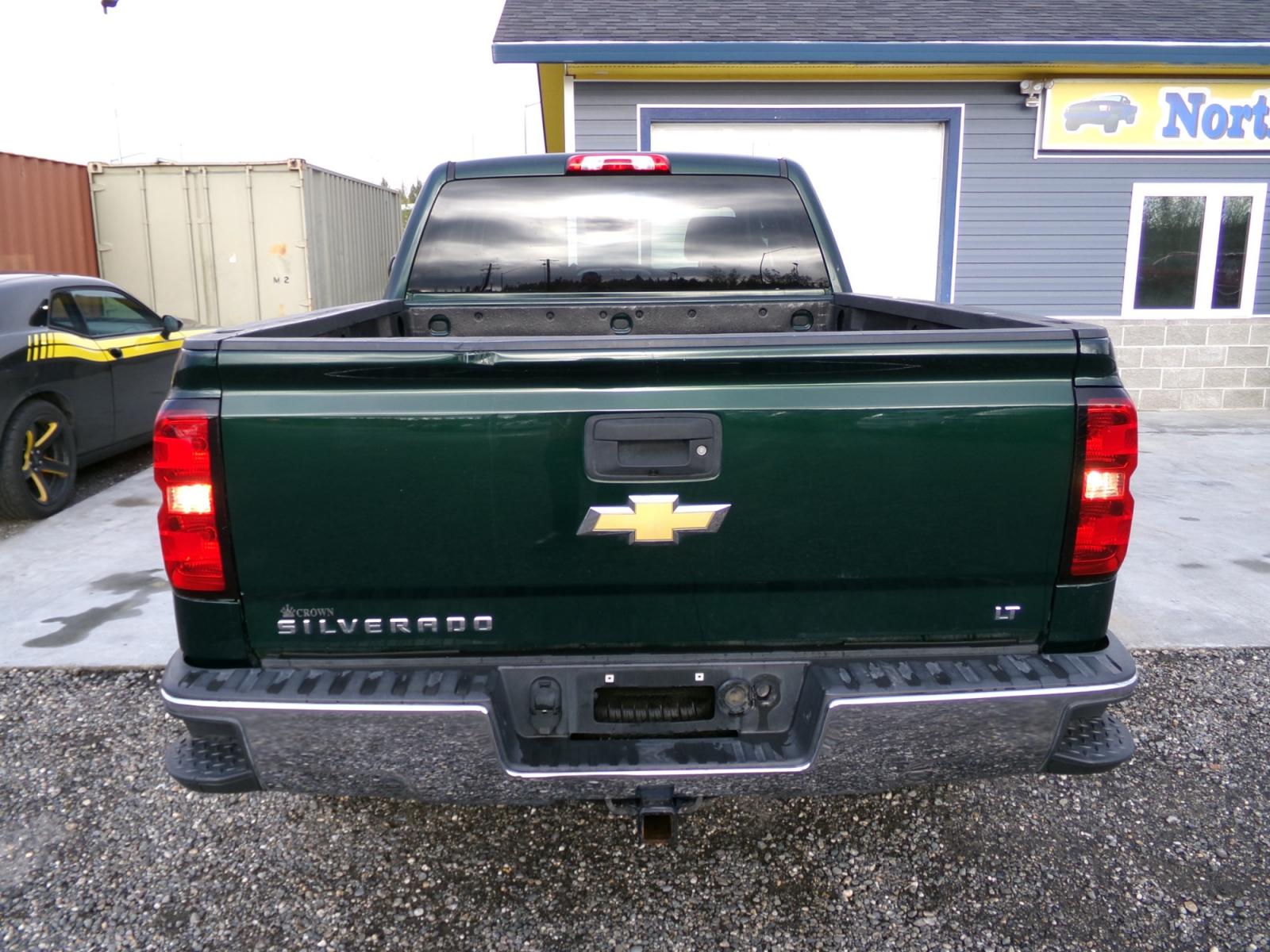 2014 Green Chevrolet Silverado 1500 1LT Double Cab 4WD (1GCVKREC9EZ) with an 5.3L V8 OHV 16V engine, 6-Speed Automatic transmission, located at 2630 Philips Field Rd., Fairbanks, AK, 99709, (907) 458-0593, 64.848068, -147.780609 - Photo #3