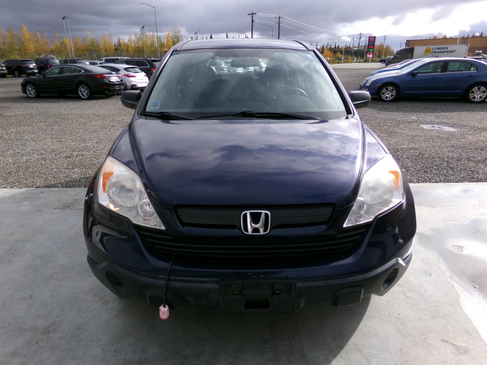 2007 Blue Honda CR-V LX 4WD AT (JHLRE48367C) with an 2.4L L4 DOHC 16V engine, 5-Speed Automatic Overdrive transmission, located at 2630 Philips Field Rd., Fairbanks, AK, 99709, (907) 458-0593, 64.848068, -147.780609 - Photo #1