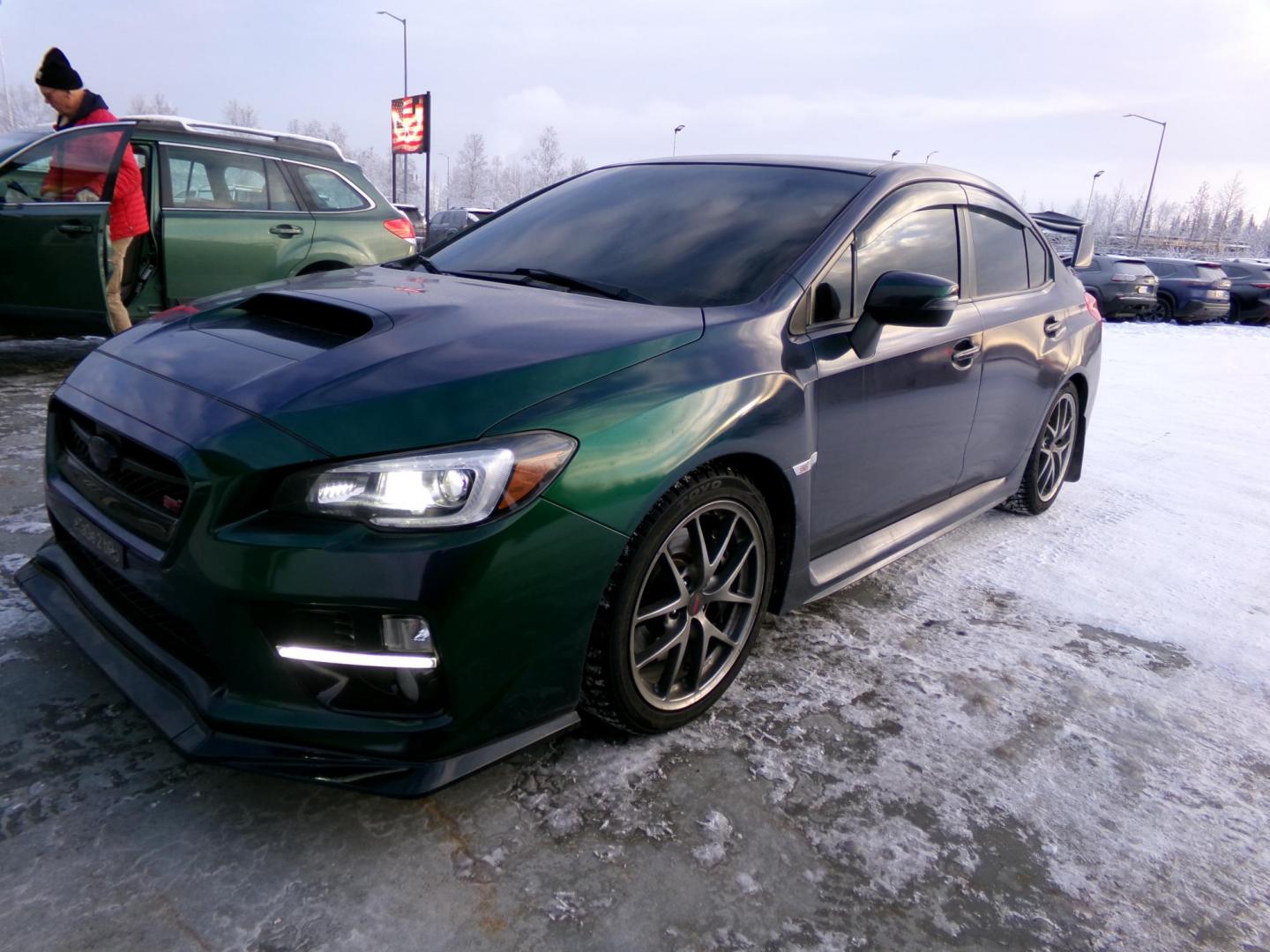 2015 Green /Black Subaru WRX STI 4-Door (JF1VA2U69F9) with an 2.5L H4 DOHC 16V engine, 6-Speed Manual transmission, located at 2630 Philips Field Rd., Fairbanks, AK, 99709, (907) 458-0593, 64.848068, -147.780609 - Photo#0