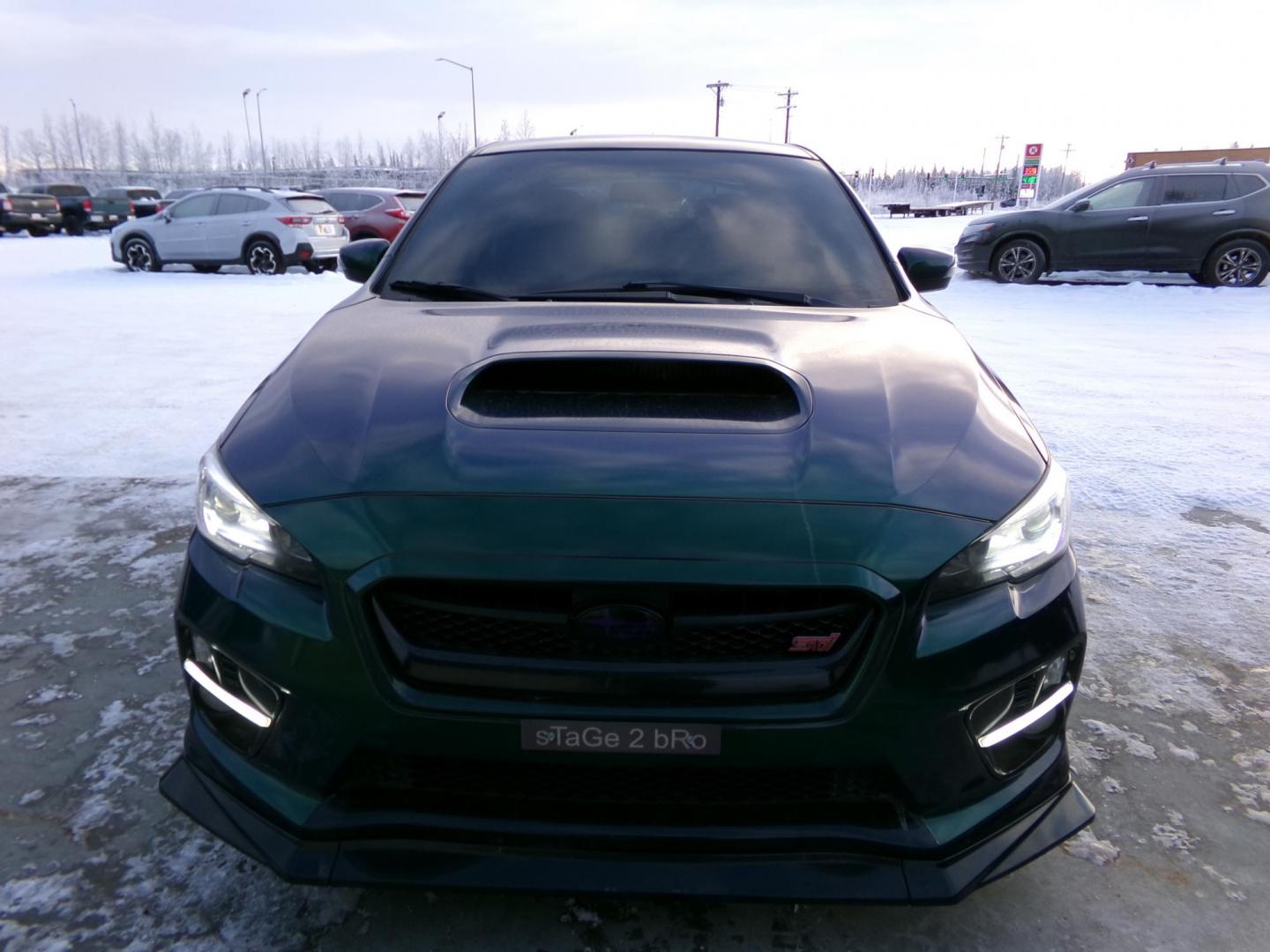 2015 Green /Black Subaru WRX STI 4-Door (JF1VA2U69F9) with an 2.5L H4 DOHC 16V engine, 6-Speed Manual transmission, located at 2630 Philips Field Rd., Fairbanks, AK, 99709, (907) 458-0593, 64.848068, -147.780609 - Photo#1