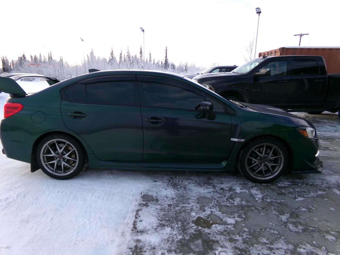 2015 Green /Black Subaru WRX STI 4-Door (JF1VA2U69F9) with an 2.5L H4 DOHC 16V engine, 6-Speed Manual transmission, located at 2630 Philips Field Rd., Fairbanks, AK, 99709, (907) 458-0593, 64.848068, -147.780609 - Photo#2