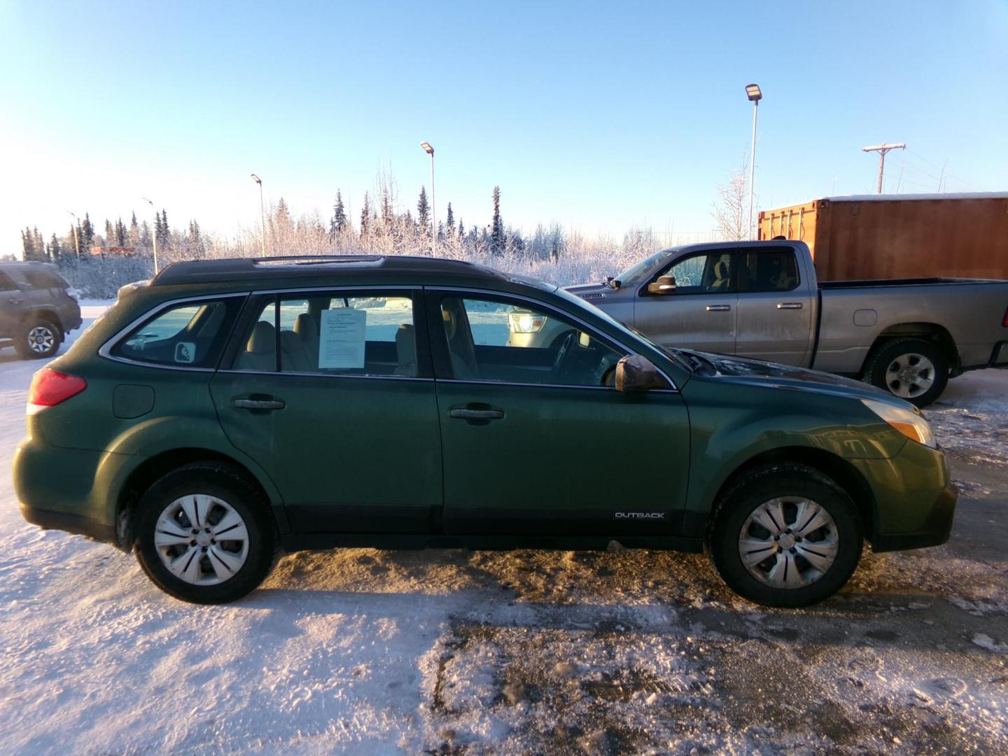 2013 Green Subaru Outback 2.5i (4S4BRBAC1D3) with an 2.5L H4 DOHC 16V engine, located at 2630 Philips Field Rd., Fairbanks, AK, 99709, (907) 458-0593, 64.848068, -147.780609 - Photo#2
