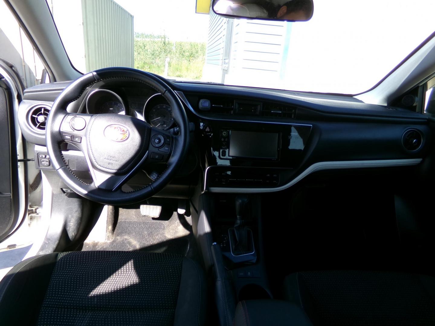 2017 White Toyota Corolla 6M (JTNKARJE9HJ) with an 1.8L L4 DOHC 16V engine, 6M transmission, located at 2630 Philips Field Rd., Fairbanks, AK, 99709, (907) 458-0593, 64.848068, -147.780609 - Photo#4