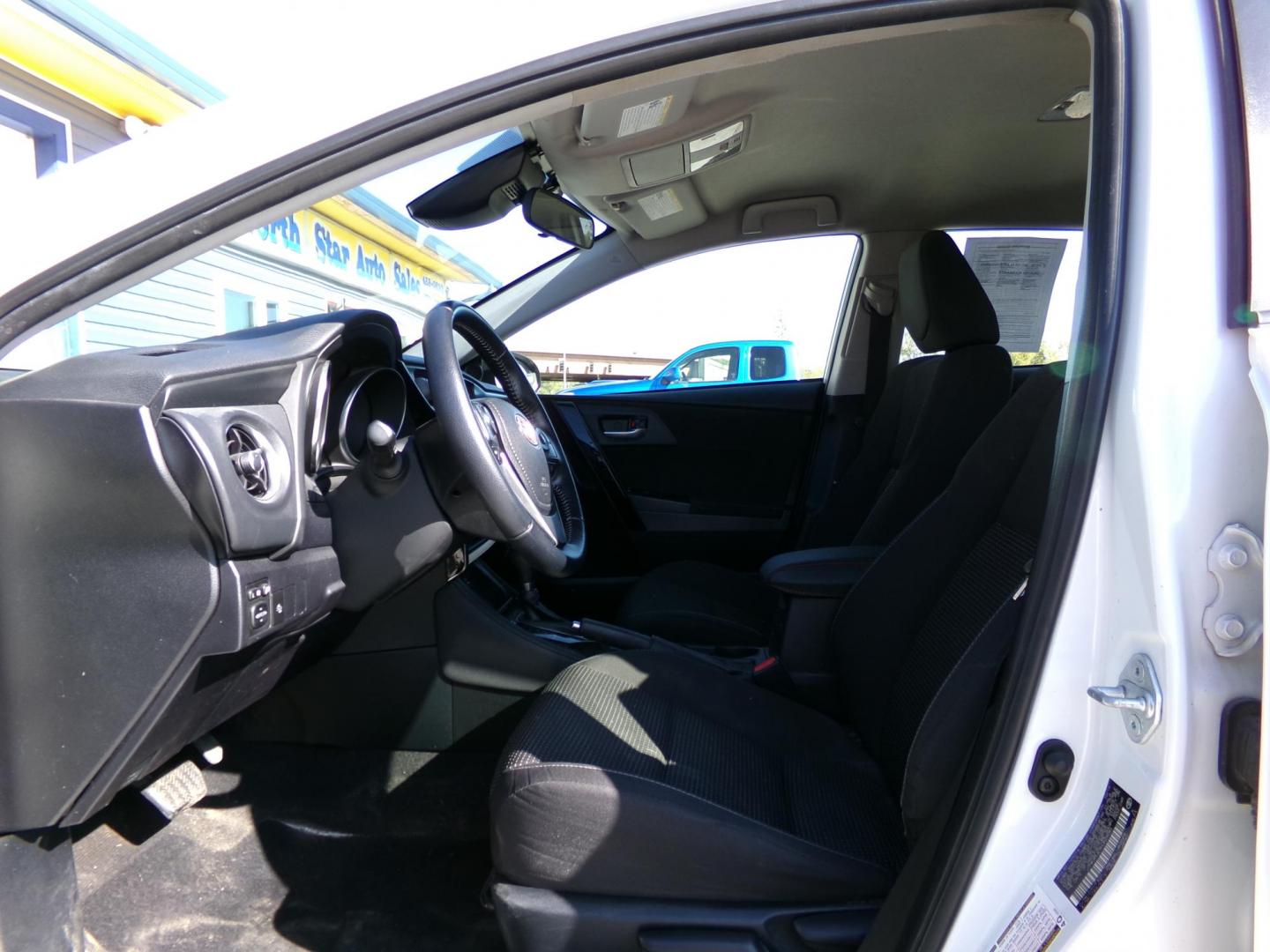 2017 White Toyota Corolla 6M (JTNKARJE9HJ) with an 1.8L L4 DOHC 16V engine, 6M transmission, located at 2630 Philips Field Rd., Fairbanks, AK, 99709, (907) 458-0593, 64.848068, -147.780609 - Photo#5
