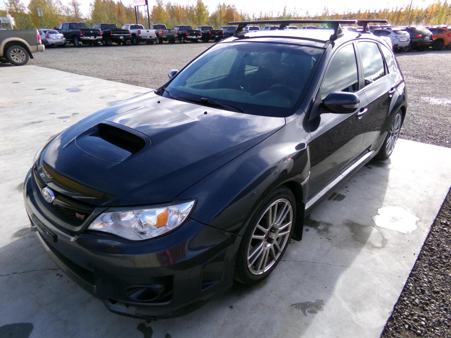 2012 Grey Subaru Impreza WRX STI 5-door (JF1GR8H67CL) with an 2.5L H4 DOHC 16V TURBO engine, 6-Speed Manual transmission, located at 2630 Philips Field Rd., Fairbanks, AK, 99709, (907) 458-0593, 64.848068, -147.780609 - Photo#0