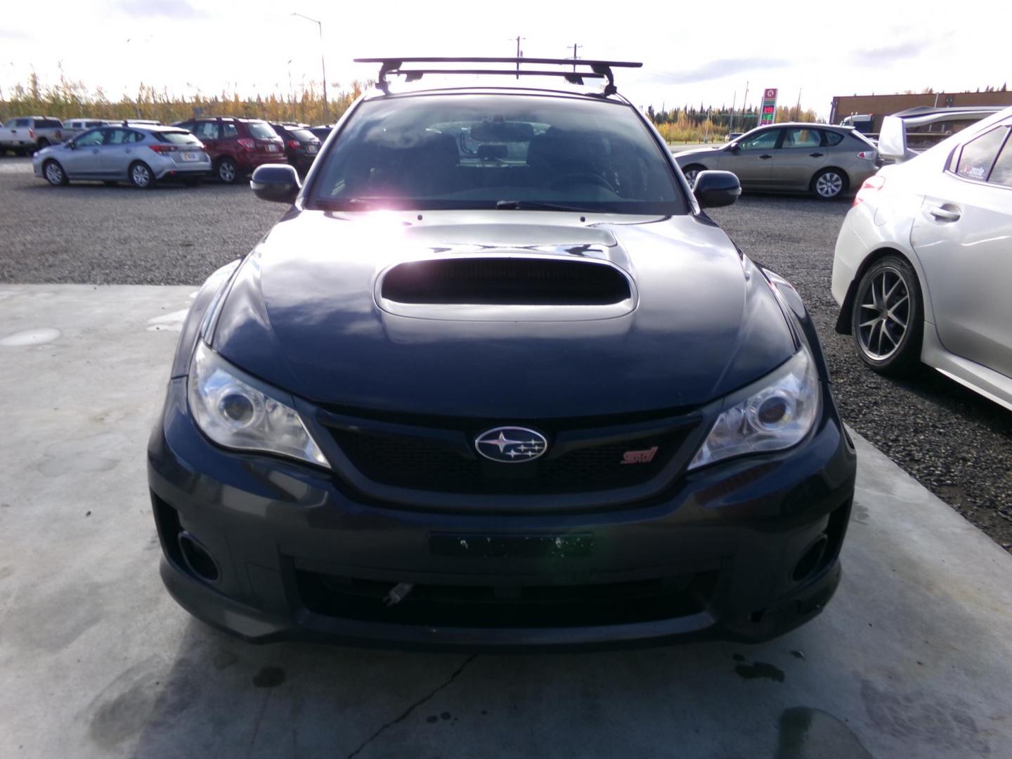 2012 Grey Subaru Impreza WRX STI 5-door (JF1GR8H67CL) with an 2.5L H4 DOHC 16V TURBO engine, 6-Speed Manual transmission, located at 2630 Philips Field Rd., Fairbanks, AK, 99709, (907) 458-0593, 64.848068, -147.780609 - Photo#1