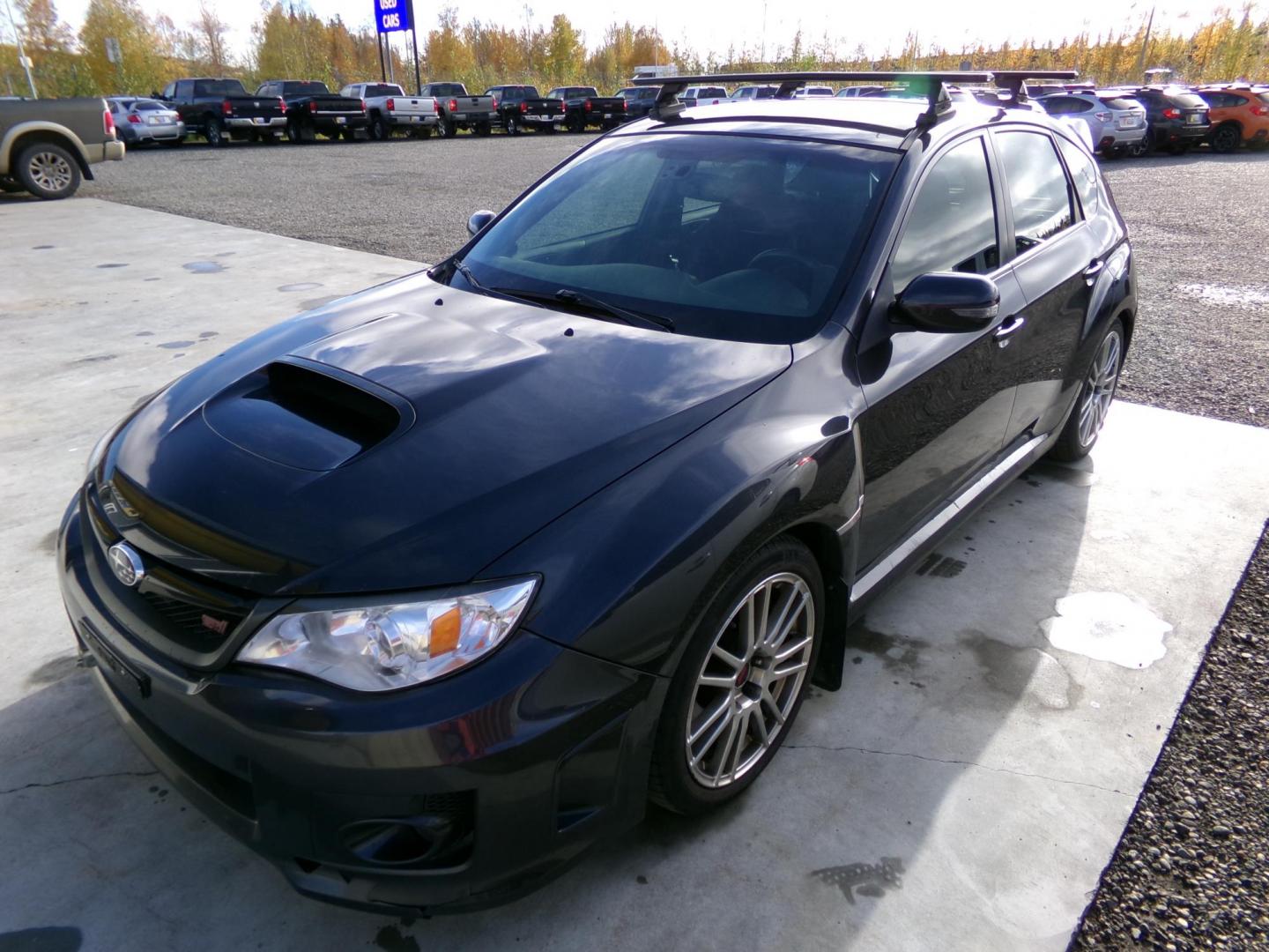 2012 Grey Subaru Impreza WRX STI 5-door (JF1GR8H67CL) with an 2.5L H4 DOHC 16V TURBO engine, 6-Speed Manual transmission, located at 2630 Philips Field Rd., Fairbanks, AK, 99709, (907) 458-0593, 64.848068, -147.780609 - Photo#2