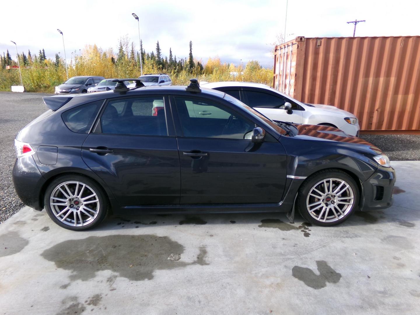 2012 Grey Subaru Impreza WRX STI 5-door (JF1GR8H67CL) with an 2.5L H4 DOHC 16V TURBO engine, 6-Speed Manual transmission, located at 2630 Philips Field Rd., Fairbanks, AK, 99709, (907) 458-0593, 64.848068, -147.780609 - Photo#6