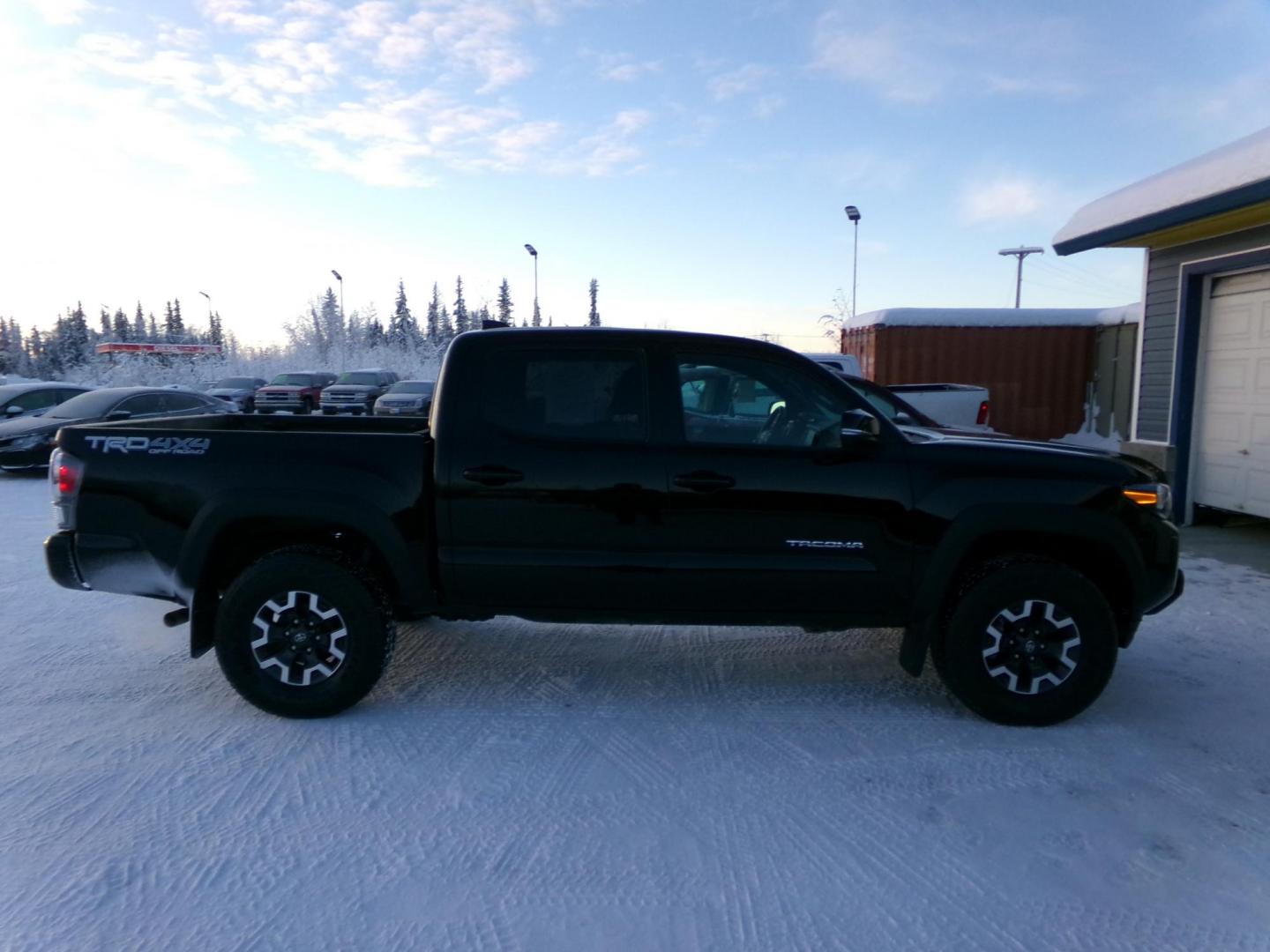 2023 Black Toyota Tacoma SR5 Double Cab Long Bed V6 6AT 4WD (3TMCZ5AN9PM) with an 3.5L V6 DOHC 24V engine, 6A transmission, located at 2630 Philips Field Rd., Fairbanks, AK, 99709, (907) 458-0593, 64.848068, -147.780609 - Photo#2