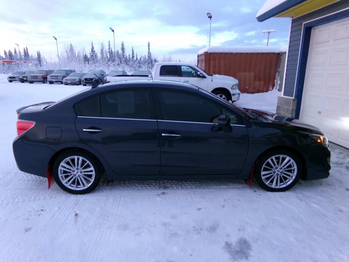 2015 Black Subaru Impreza 2.0i Limited PZEV 4-Door (JF1GJAS63FH) with an 2.0L H4 DOHC 16V engine, Continuously Variable Transmission transmission, located at 2630 Philips Field Rd., Fairbanks, AK, 99709, (907) 458-0593, 64.848068, -147.780609 - Photo#1