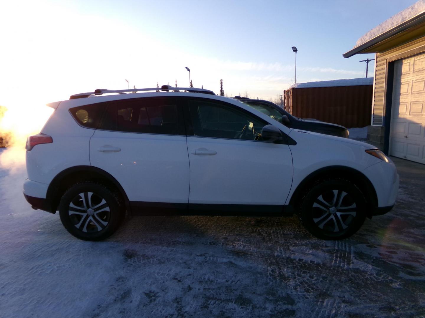 2016 White Toyota RAV4 LE AWD (JTMBFREV6GJ) with an 2.5L L4 DOHC 16V engine, 6A transmission, located at 2630 Philips Field Rd., Fairbanks, AK, 99709, (907) 458-0593, 64.848068, -147.780609 - Photo#1
