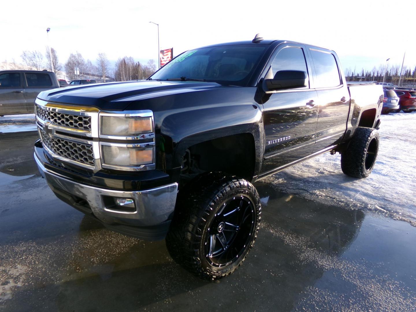 2015 Black Chevrolet Silverado 1500 LT Crew Cab 4WD (3GCUKRECXFG) with an 5.3L V8 OHV 16V engine, 6-Speed Automatic transmission, located at 2630 Philips Field Rd., Fairbanks, AK, 99709, (907) 458-0593, 64.848068, -147.780609 - Photo#0