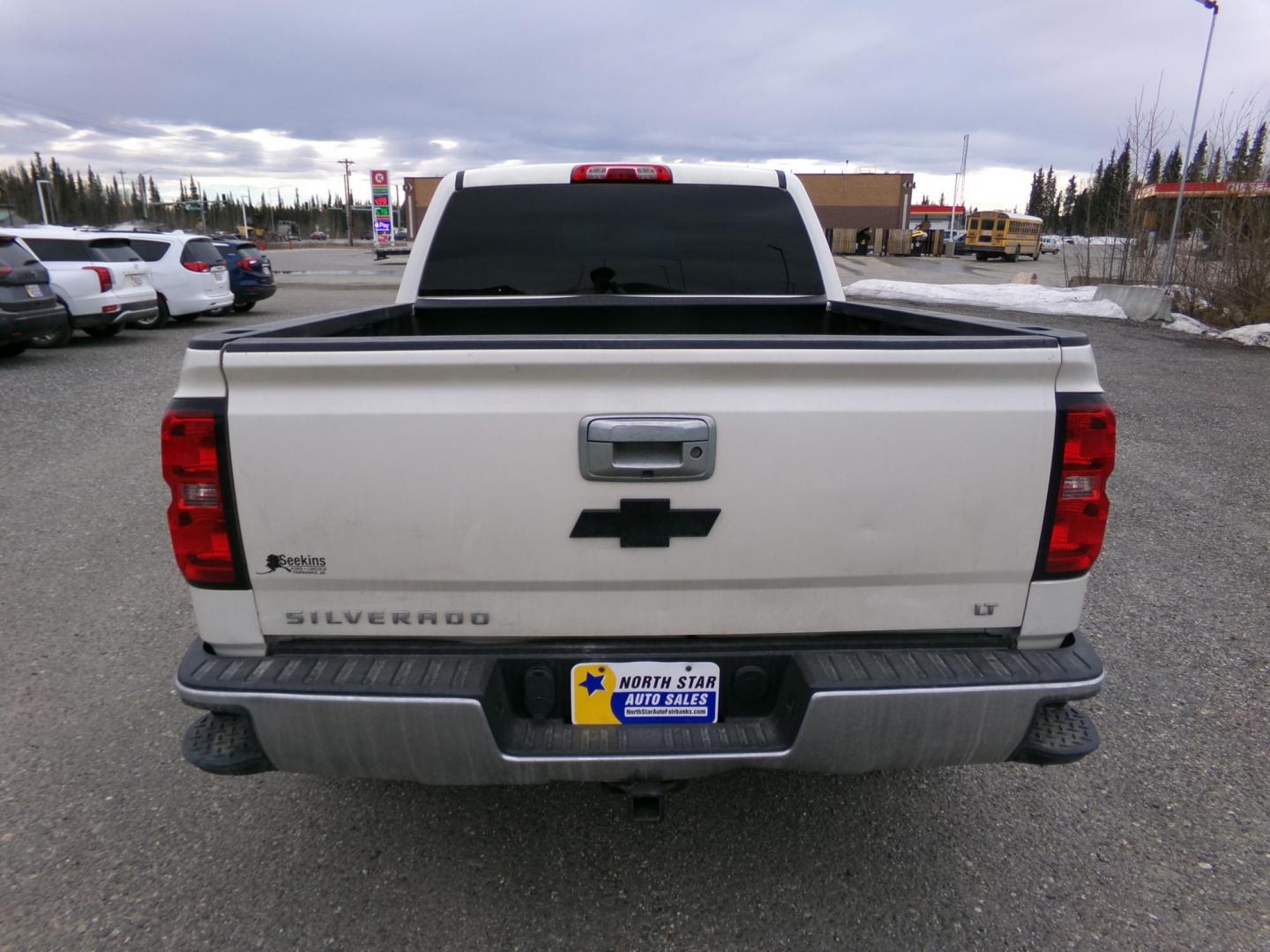 2014 White Chevrolet Silverado 1500 1LT Crew Cab 4WD (3GCUKREC8EG) with an 5.3L V8 OHV 16V engine, 6-Speed Automatic transmission, located at 2630 Philips Field Rd., Fairbanks, AK, 99709, (907) 458-0593, 64.848068, -147.780609 - Photo#3