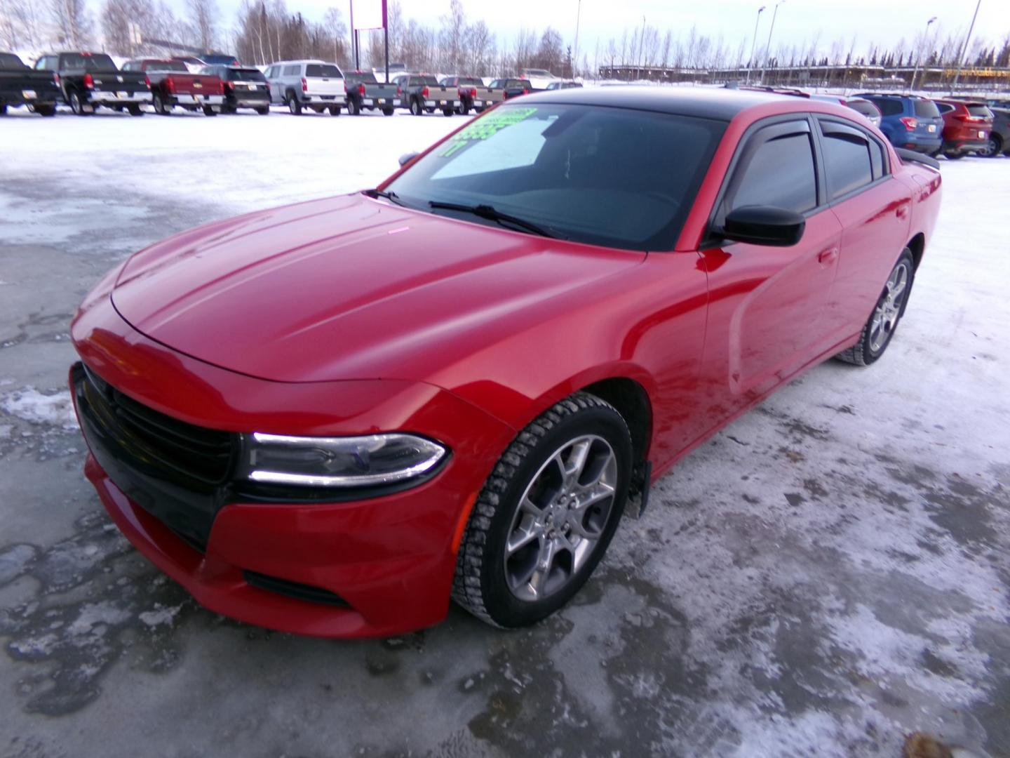 2017 Red /Black Dodge Charger SXT AWD (2C3CDXJG0HH) with an 3.6L V6 DOHC 24V engine, 8A transmission, located at 2630 Philips Field Rd., Fairbanks, AK, 99709, (907) 458-0593, 64.848068, -147.780609 - Photo#0