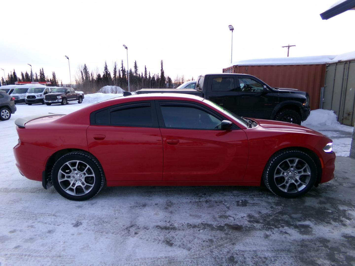 2017 Red /Black Dodge Charger SXT AWD (2C3CDXJG0HH) with an 3.6L V6 DOHC 24V engine, 8A transmission, located at 2630 Philips Field Rd., Fairbanks, AK, 99709, (907) 458-0593, 64.848068, -147.780609 - Photo#2
