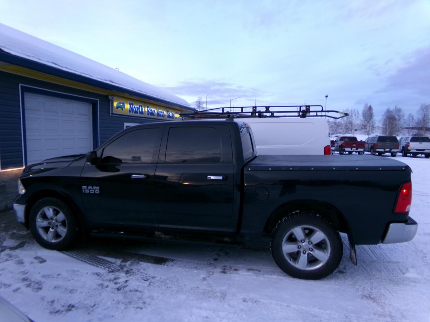2014 Blue /Black Dodge 1500 SLT Crew Cab SWB 4WD (1C6RR7LG3ES) with an 3.6L V6 DOHC 24V FFV engine, 6-Speed Automatic transmission, located at 2630 Philips Field Rd., Fairbanks, AK, 99709, (907) 458-0593, 64.848068, -147.780609 - Photo#2