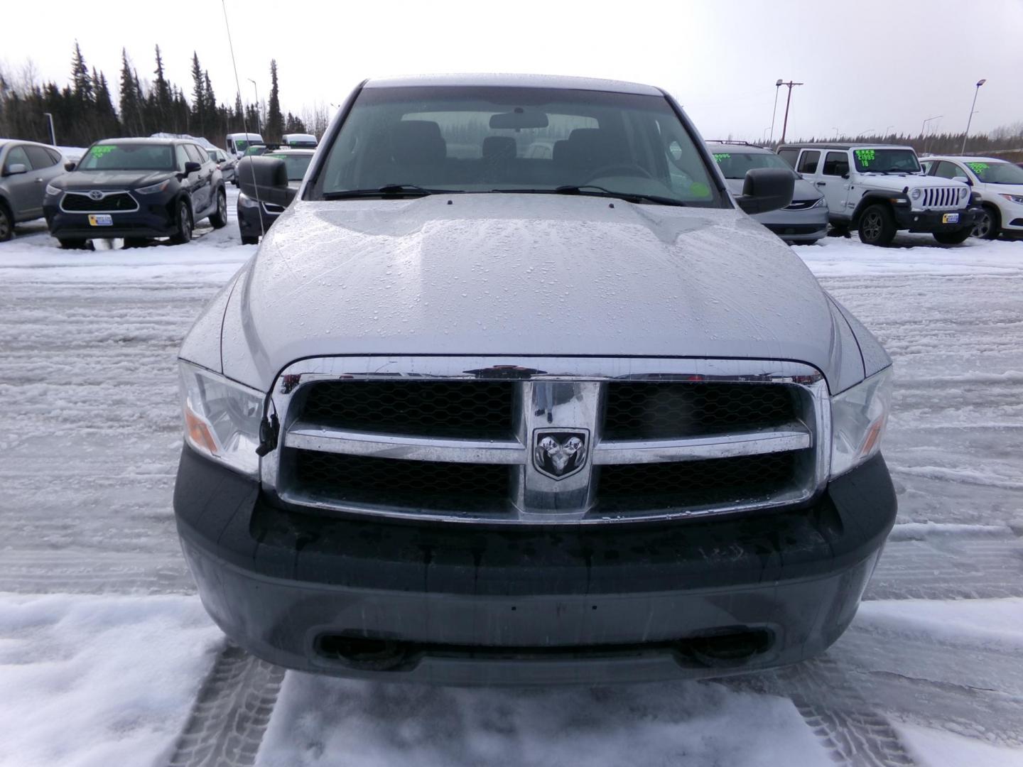 2010 Silver /Black Dodge Ram 1500 Laramie Crew Cab 4WD (1D7RV1CP0AS) with an 4.7L V8 SOHC 16V FFV engine, 5-Speed Automatic transmission, located at 2630 Philips Field Rd., Fairbanks, AK, 99709, (907) 458-0593, 64.848068, -147.780609 - Photo#1