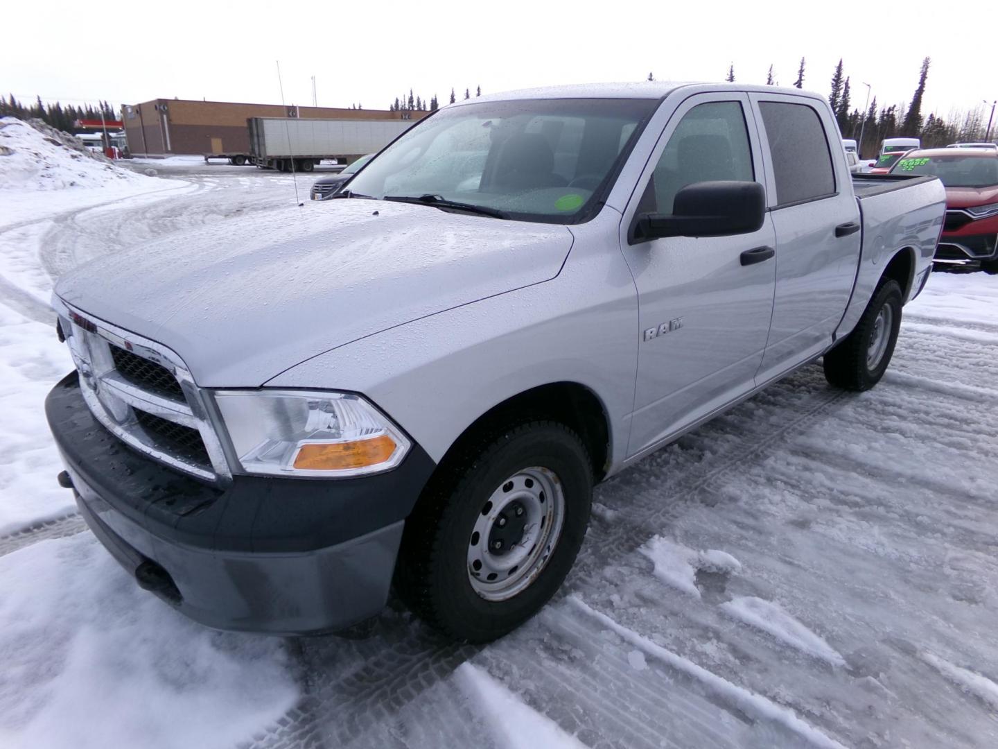 2010 Silver /Black Dodge Ram 1500 Laramie Crew Cab 4WD (1D7RV1CP0AS) with an 4.7L V8 SOHC 16V FFV engine, 5-Speed Automatic transmission, located at 2630 Philips Field Rd., Fairbanks, AK, 99709, (907) 458-0593, 64.848068, -147.780609 - Photo#0