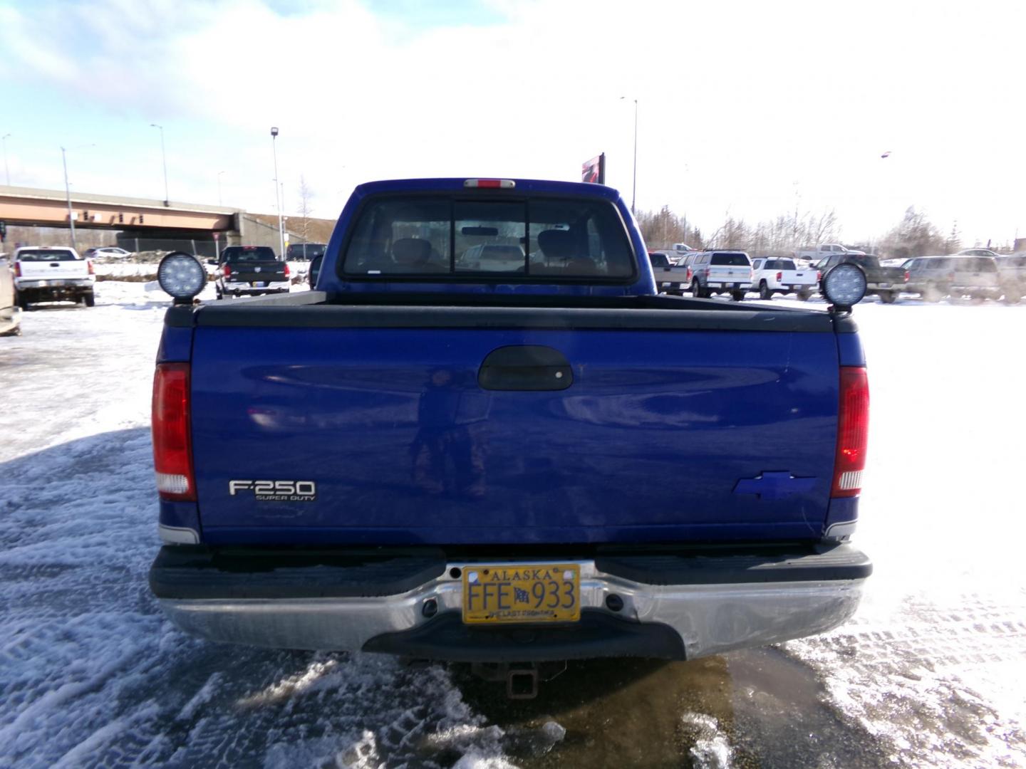 2003 Blue /Black Ford F-250 SD Lariat SuperCab 4WD (1FTNX21L83E) with an 5.4L V8 SOHC 16V engine, 4-Speed Automatic Overdrive transmission, located at 2630 Philips Field Rd., Fairbanks, AK, 99709, (907) 458-0593, 64.848068, -147.780609 - Photo#4