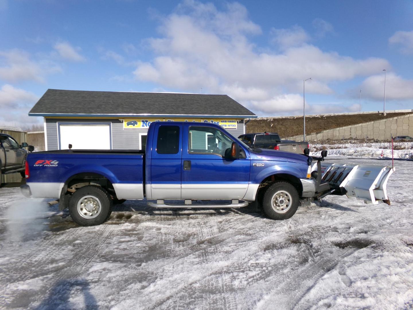 2003 Blue /Black Ford F-250 SD Lariat SuperCab 4WD (1FTNX21L83E) with an 5.4L V8 SOHC 16V engine, 4-Speed Automatic Overdrive transmission, located at 2630 Philips Field Rd., Fairbanks, AK, 99709, (907) 458-0593, 64.848068, -147.780609 - Photo#3