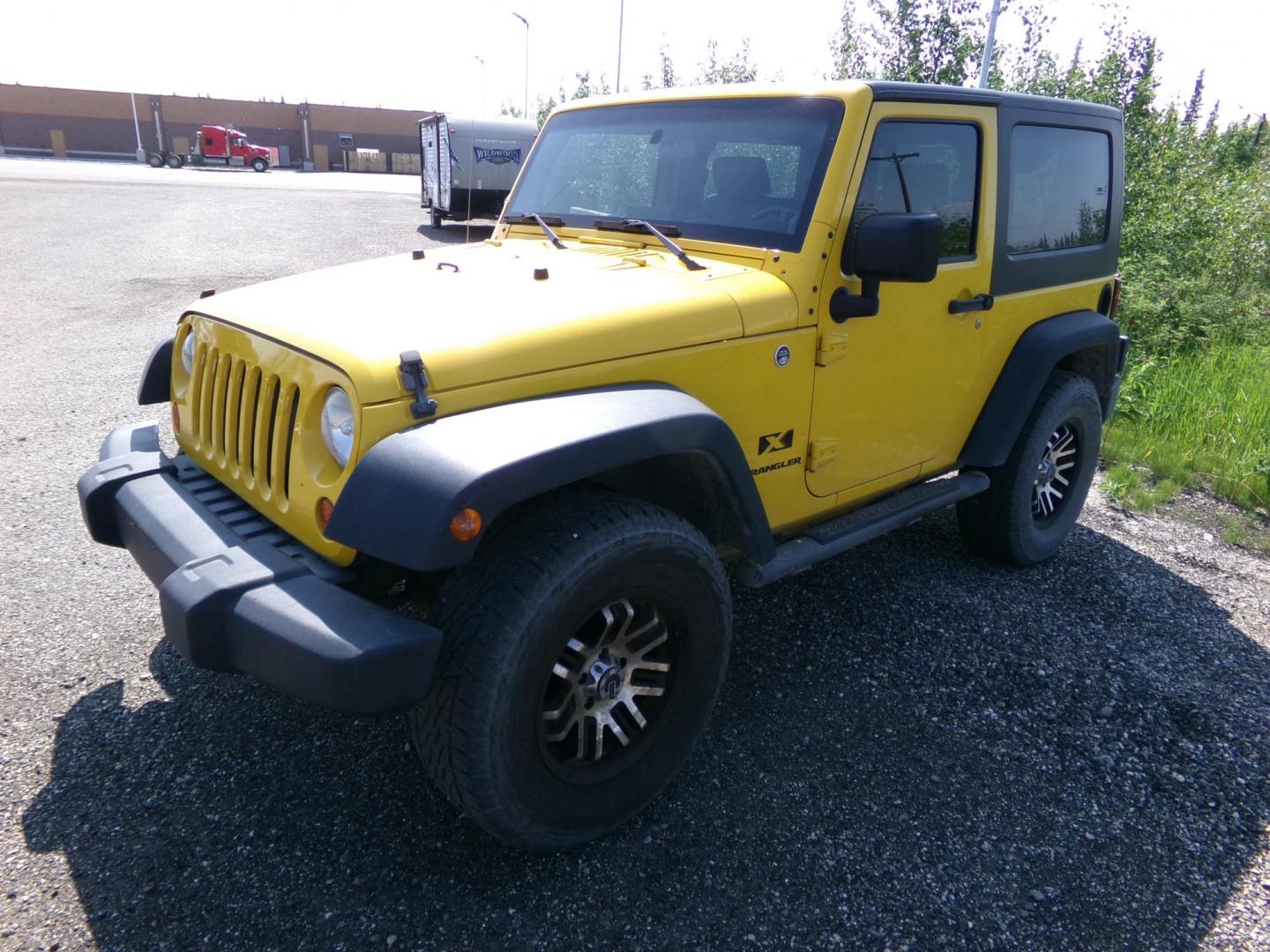 2009 Yellow Jeep Wrangler X (1J4FA24119L) with an 3.8L V6 OHV 12V engine, located at 2630 Philips Field Rd., Fairbanks, AK, 99709, (907) 458-0593, 64.848068, -147.780609 - Photo#0