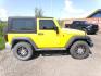 2009 Yellow Jeep Wrangler X (1J4FA24119L) with an 3.8L V6 OHV 12V engine, located at 2630 Philips Field Rd., Fairbanks, AK, 99709, (907) 458-0593, 64.848068, -147.780609 - Photo#2