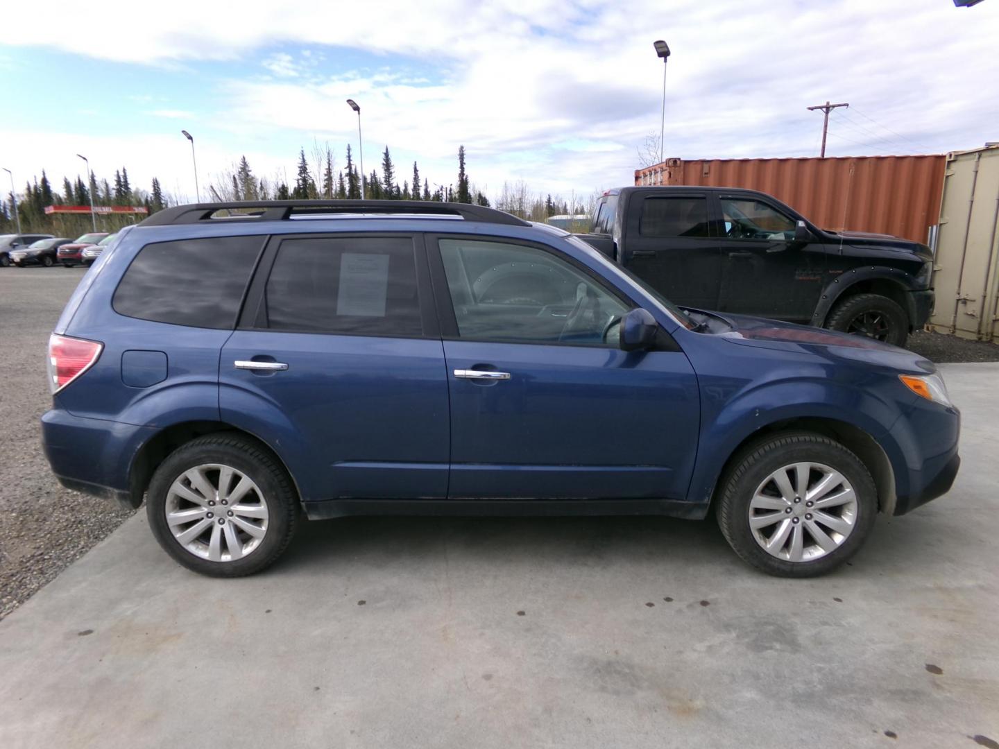 2011 Blue Subaru Forester 2.5X Premium (JF2SHADC8BG) with an 2.5L H4 SOHC 16V engine, 5-Speed Manual transmission, located at 2630 Philips Field Rd., Fairbanks, AK, 99709, (907) 458-0593, 64.848068, -147.780609 - Photo#2