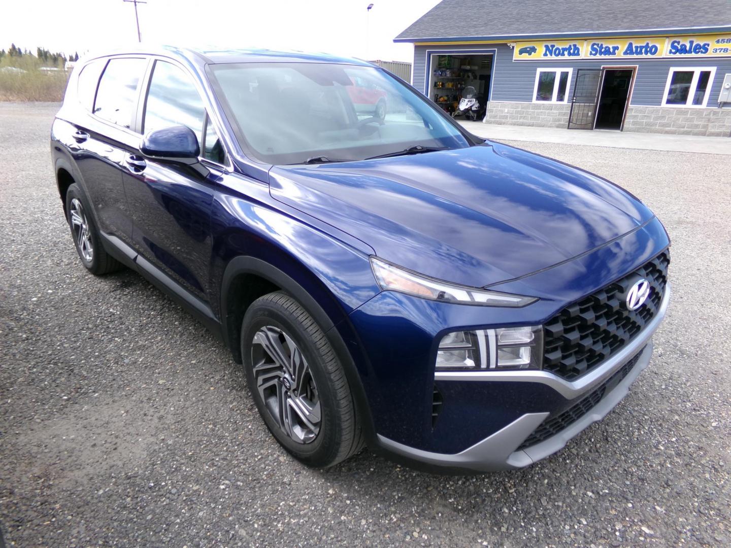 2022 Blue Hyundai Santa Fe SE (5NMS14AJ3NH) with an 2.5L L4 DOHC 16V engine, 6A transmission, located at 2630 Philips Field Rd., Fairbanks, AK, 99709, (907) 458-0593, 64.848068, -147.780609 - Photo#0