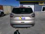 2017 Gold Ford Escape Titanium FWD (1FMCU0J96HU) with an 2.0L L4 DOHC 16V engine, 6A transmission, located at 2630 Philips Field Rd., Fairbanks, AK, 99709, (907) 458-0593, 64.848068, -147.780609 - Photo#3