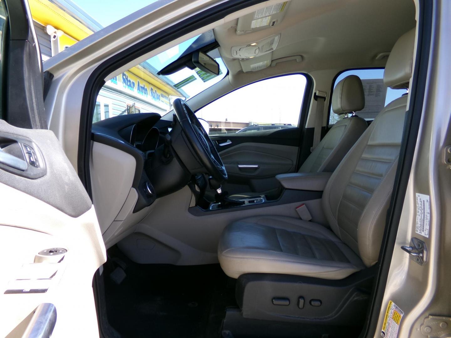 2017 Gold Ford Escape Titanium FWD (1FMCU0J96HU) with an 2.0L L4 DOHC 16V engine, 6A transmission, located at 2630 Philips Field Rd., Fairbanks, AK, 99709, (907) 458-0593, 64.848068, -147.780609 - Photo#4