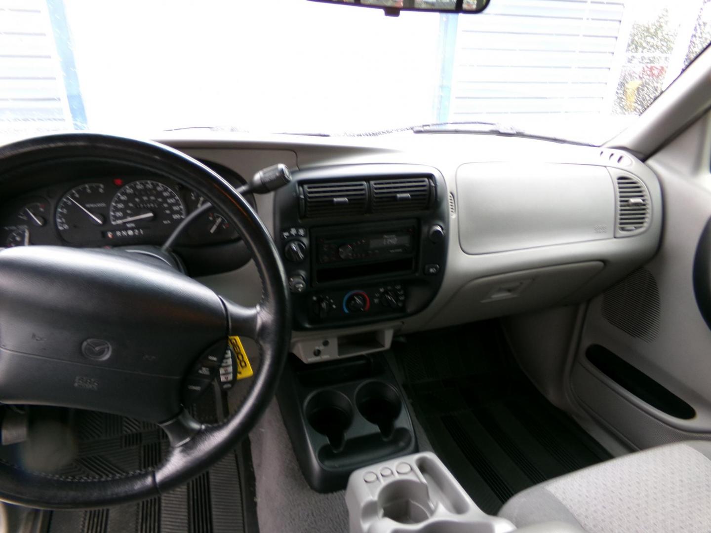 2000 White Mazda B-Series B4000 Cab Plus 4 Troy Lee 4WD (4F4ZR17X8YT) with an 4.0L V6 OHV 12V engine, located at 2630 Philips Field Rd., Fairbanks, AK, 99709, (907) 458-0593, 64.848068, -147.780609 - Photo#6
