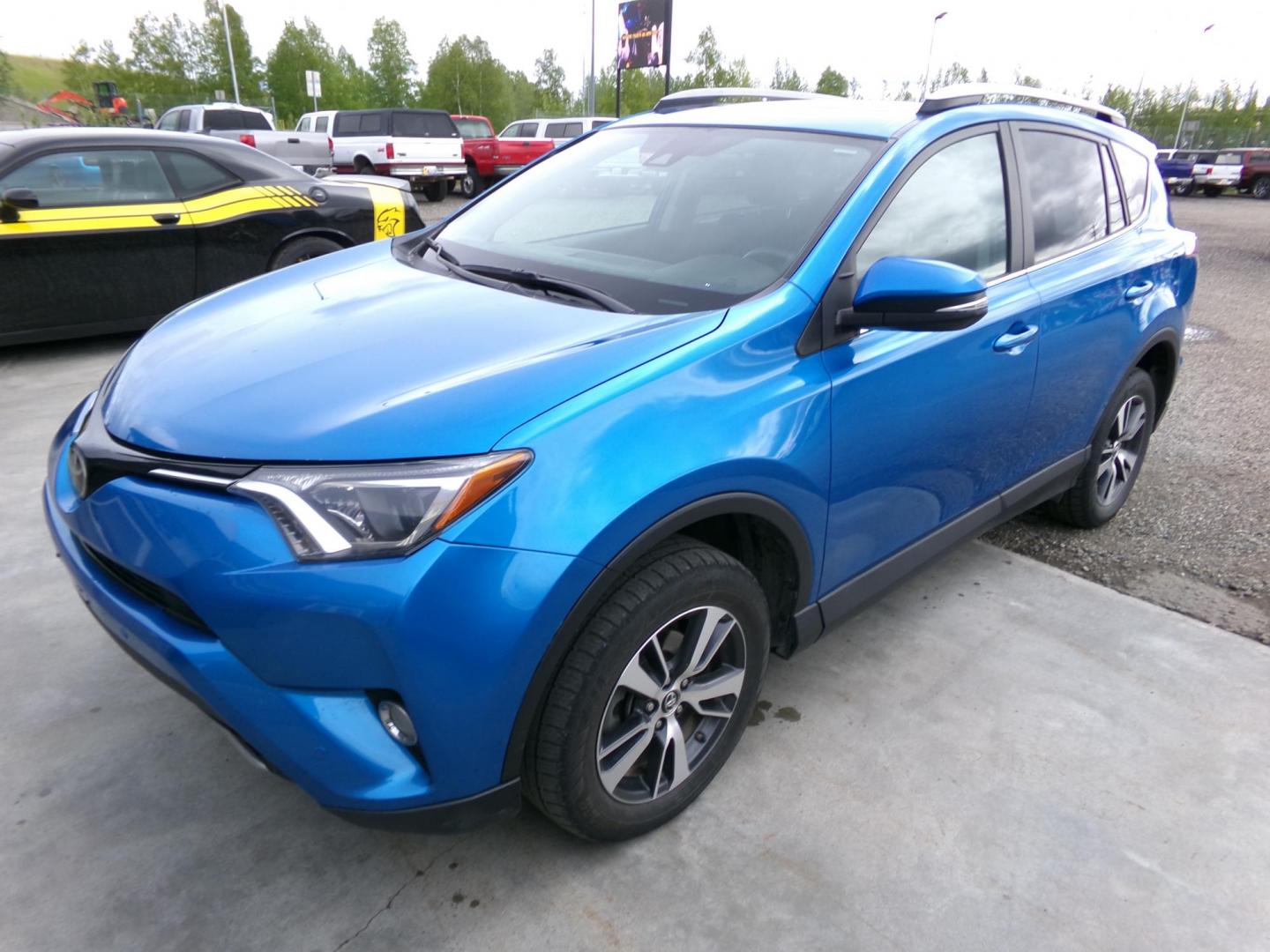 2018 Blue Toyota RAV4 XLE AWD (2T3RFREV1JW) with an 2.5L L4 DOHC 16V engine, 6A transmission, located at 2630 Philips Field Rd., Fairbanks, AK, 99709, (907) 458-0593, 64.848068, -147.780609 - Photo#0