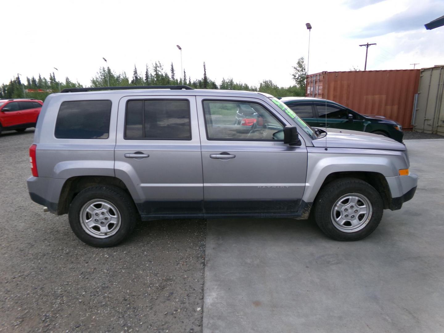 2016 Silver Jeep Patriot Sport 4WD (1C4NJRBB2GD) with an 2.4L L4 DOHC 16V engine, located at 2630 Philips Field Rd., Fairbanks, AK, 99709, (907) 458-0593, 64.848068, -147.780609 - Photo#2