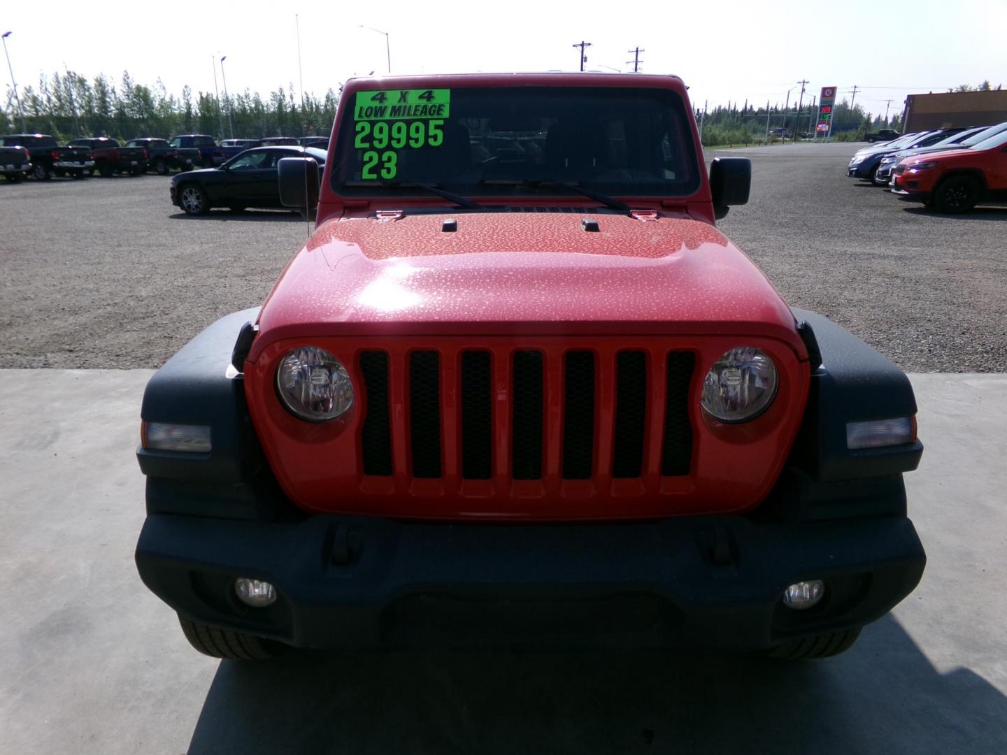 2023 Red Jeep Wrangler Unlimited Sport (1C4HJXDN5PW) with an 2.0L L4 DOHC 16V TURBO engine, 6M transmission, located at 2630 Philips Field Rd., Fairbanks, AK, 99709, (907) 458-0593, 64.848068, -147.780609 - Photo#1
