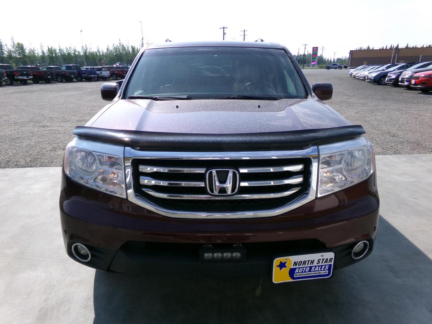 2012 Red Honda Pilot Touring 4WD 5-Spd AT with DVD (5FNYF4H91CB) with an 3.5L V6 SOHC 24V engine, 5-Speed Automatic transmission, located at 2630 Philips Field Rd., Fairbanks, AK, 99709, (907) 458-0593, 64.848068, -147.780609 - Photo#1