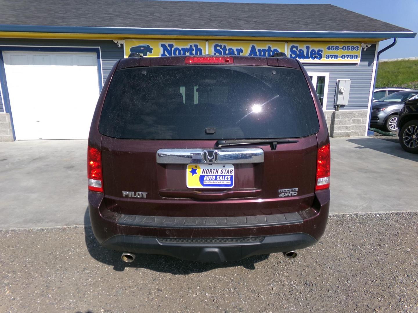 2012 Red Honda Pilot Touring 4WD 5-Spd AT with DVD (5FNYF4H91CB) with an 3.5L V6 SOHC 24V engine, 5-Speed Automatic transmission, located at 2630 Philips Field Rd., Fairbanks, AK, 99709, (907) 458-0593, 64.848068, -147.780609 - Photo#3