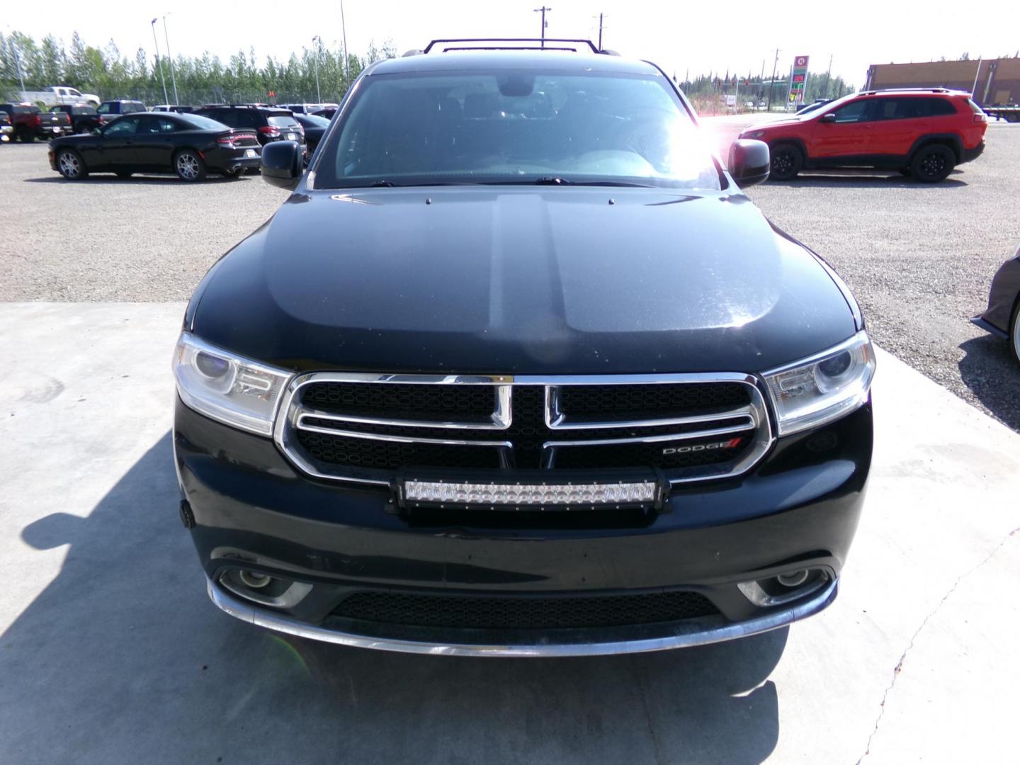 2014 Black Dodge Durango SXT AWD (1C4RDJAG3EC) with an 3.6L V6 DOHC 24V engine, 8-Speed Automatic transmission, located at 2630 Philips Field Rd., Fairbanks, AK, 99709, (907) 458-0593, 64.848068, -147.780609 - Photo#1