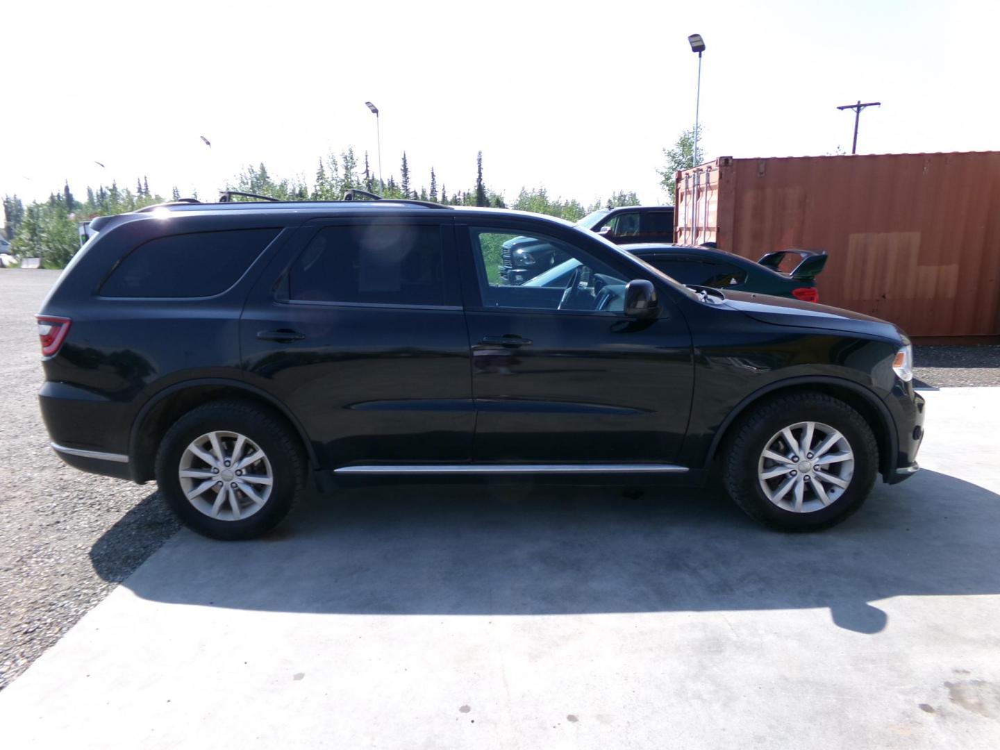 2014 Black Dodge Durango SXT AWD (1C4RDJAG3EC) with an 3.6L V6 DOHC 24V engine, 8-Speed Automatic transmission, located at 2630 Philips Field Rd., Fairbanks, AK, 99709, (907) 458-0593, 64.848068, -147.780609 - Photo#2