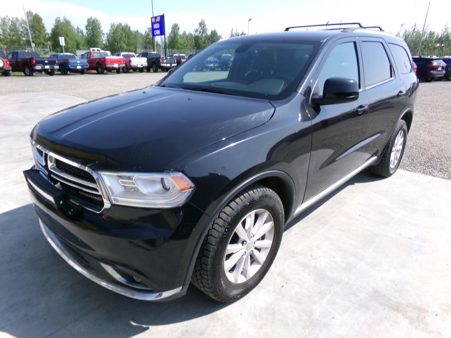 2014 Black Dodge Durango SXT AWD (1C4RDJAG3EC) with an 3.6L V6 DOHC 24V engine, 8-Speed Automatic transmission, located at 2630 Philips Field Rd., Fairbanks, AK, 99709, (907) 458-0593, 64.848068, -147.780609 - Photo#0