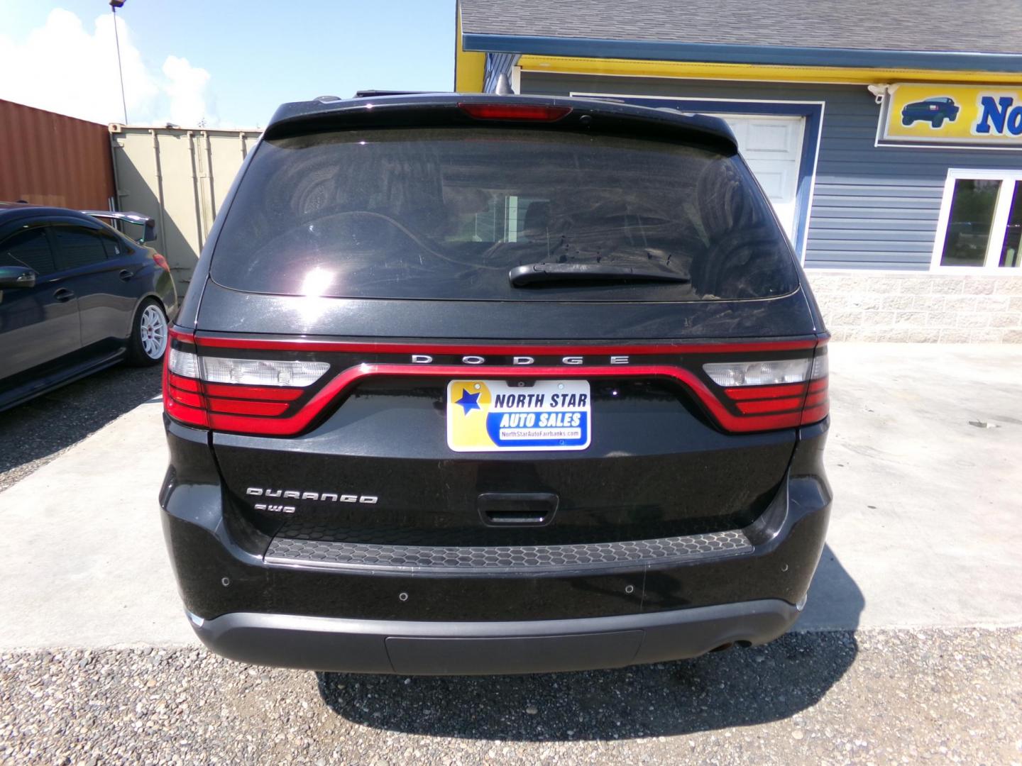 2014 Black Dodge Durango SXT AWD (1C4RDJAG3EC) with an 3.6L V6 DOHC 24V engine, 8-Speed Automatic transmission, located at 2630 Philips Field Rd., Fairbanks, AK, 99709, (907) 458-0593, 64.848068, -147.780609 - Photo#3