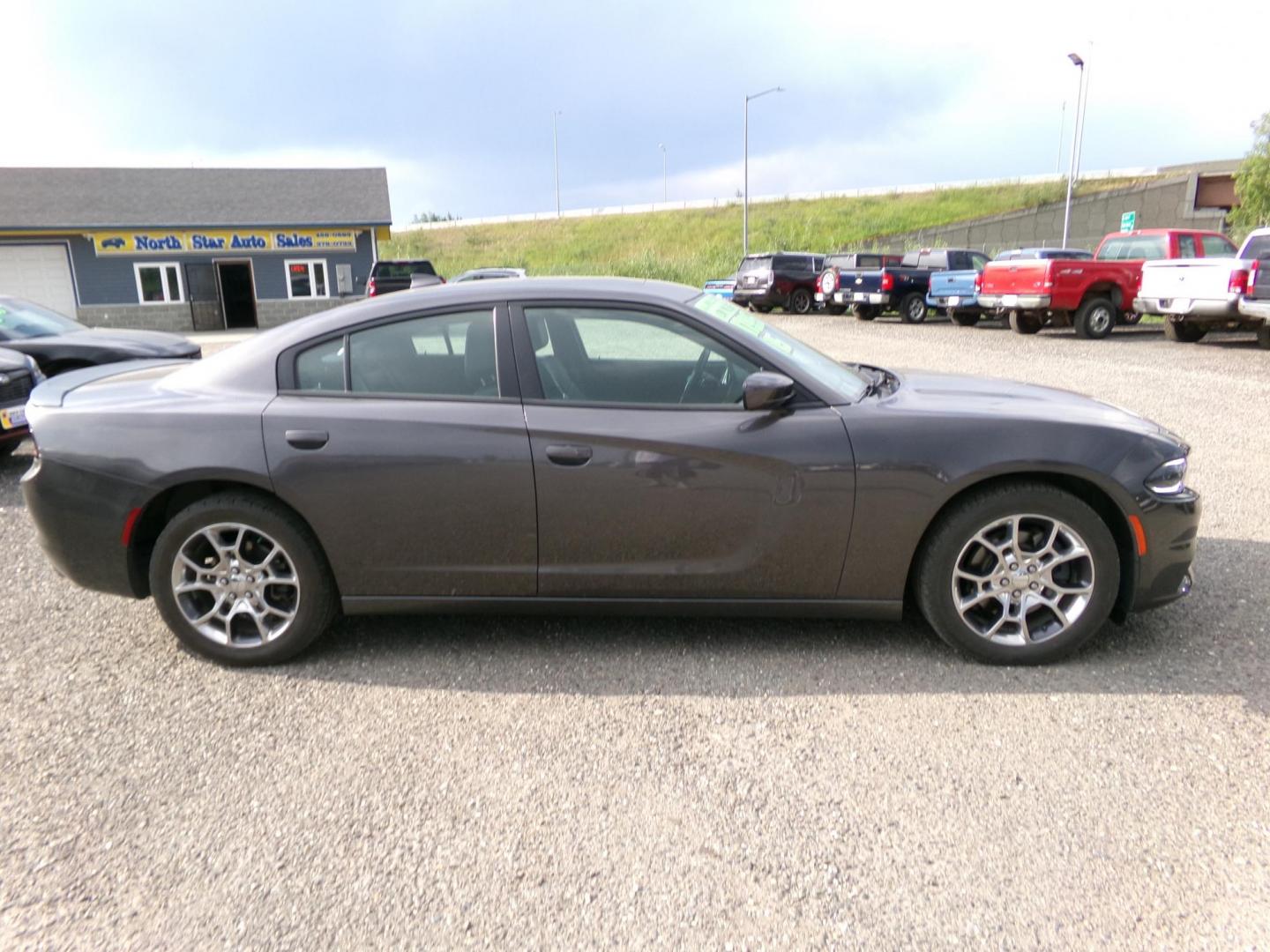 2015 Grey Dodge Charger SXT AWD (2C3CDXJG9FH) with an 3.6L V6 DOHC 24V engine, 8-Speed Automatic transmission, located at 2630 Philips Field Rd., Fairbanks, AK, 99709, (907) 458-0593, 64.848068, -147.780609 - Photo#2